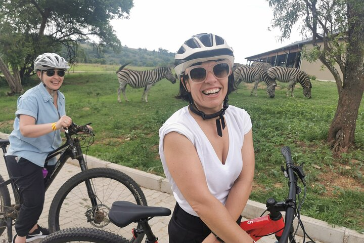 Happy Cyclists with the animals